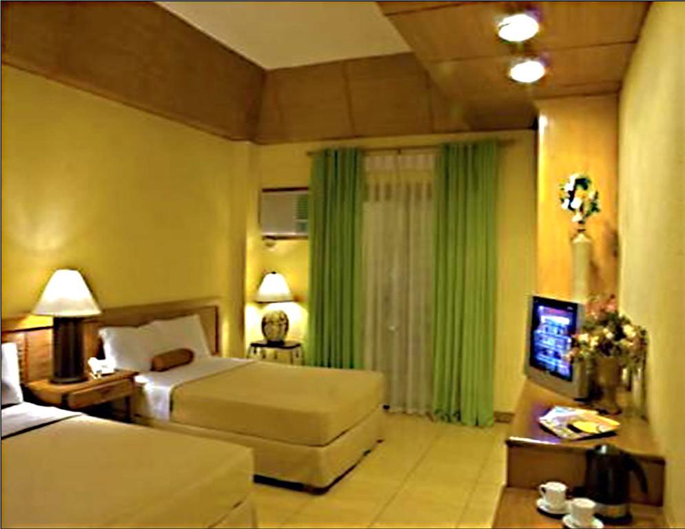 Java Hotel Laoag Kültér fotó